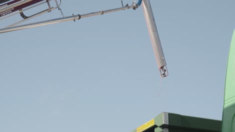 Suction-Probe-goes-Down-in-a-Truck-to-take-sample-of-grapes-for-wine-production-in-Slow-Motion-60fps