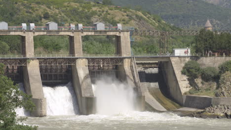 Water-Flowing-Through-Floodgates-Of-Dam-In-Mtskheta,-Georgia