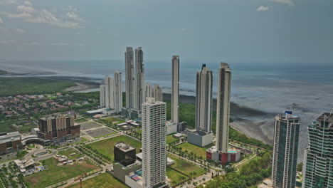 Vista-Panorámica-Aérea-De-La-Ciudad-De-Panamá-V84-Drone-Flyover-Costa-Del-Este-Barrio-Capturando-Complejo-De-Condominios-Frente-Al-Mar-Y-Comunidades-Residenciales-áreas-De-Vivienda---Filmado-Con-Cine-Mavic-3---Marzo-De-2022