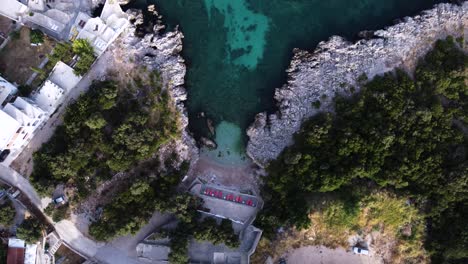 Utjeha-Small-beach-on-Adriatic-coast-of-Montenegro,-private-secluded-beach,-top-down