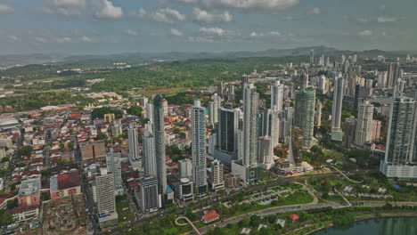 Panama-City-Aerial-v71-flyover-and-around-calidonia-capturing-cityscape-and-waterfront-high-rise-towers-across-campo-alegre,-obarrio-and-downtown-neighborhoods---Shot-with-Mavic-3-Cine---March-2022