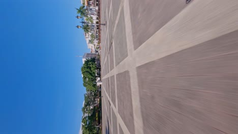 Vertical-Shot-Of-Plaza-España-Square-In-Santo-Domingo,-Dominican-Republic---Fpv