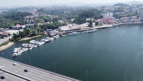 Aerial-view-of-a-bridge-and-boats-in-Porto