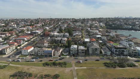 Establishing-aerial-shot-of-residential-neighborhood-suburb-real-estate-houses-at-Maroubra-Beach,-Sydney,-Australia