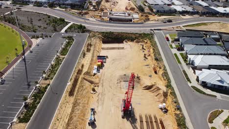 Aerial-Reveal-View-Over-Yanchep-Rail-Extension-Works,-Santorini-Promenade-Perth
