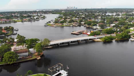 4K-Drone-Video-of-Crane-Repairing-Bridge-on-Tampa-Bay-in-St-Petersburg,-Florida-on-Sunny-Summer-Day