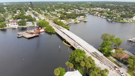 4K-Drone-Video-of-Bridge-Repair-over-Bay-in-St-Petersburg,-Florida-on-Sunny-Summer-Day