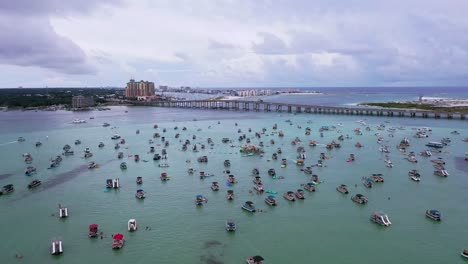 Drone-aerial-view-flying-over-Crab-Island-towards-the-bridge-going-to-the-Destin-Harbor-in-the-Panhandle-of-Florida