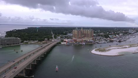 Flying-away-view-from-the-Destin-Florida-harbor-and-down-the-side-of-the-bridge