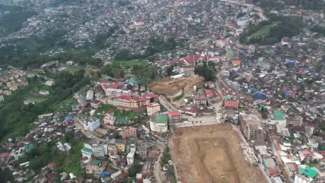 Aerial-view-of-congested-hill-town-construction-of-play-ground