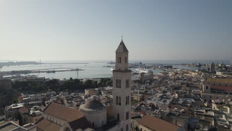 Panoramic-aerial-view-of-the-Bari-cathedral-San-Sabino-and-large-harbor-in-Bari,-Italy
