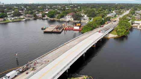 4K-Drone-Video-of-Bridge-Repair-Crews-working-on-40th-Avenue-Bridge-in-St-Petersburg,-Florida-on-Sunny-Summer-Day-1
