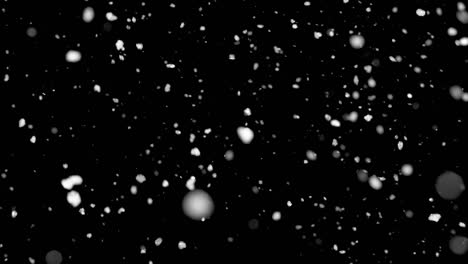 Schneepartikel-Auf-Schwarzem-Hintergrund