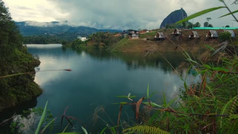 Astonishing-View-of-La-Piedra-del-PeÃ±ol-Colombia-through-Unpolluted-Blue-Lagoon-in-Guatape-Medellin