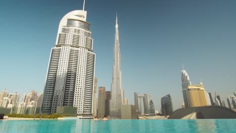 Couple-in-infinity-pool-watching-Burj-Khalifa