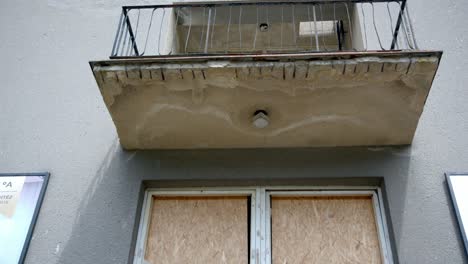 Broken-Window-Glass-Of-A-Building-In-The-Old-Soviet-Border-Post-Between-Austria-And-Czech-Republic---tilt-up