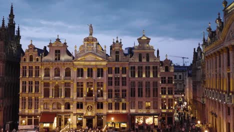 Tourist-Night-scene-at-The-Grand-Place-,-the-central-square-of-Brussels---Belgium