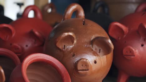 Beautiful-Handmade-Crafts-With-Piggy-Bank-In-Local-Town-Of-Pomaire-Market,-Santiago-de-Chile