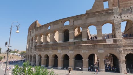 Largest-ancient-amphitheatre-in-the-world-Colosseum-in-Rome,-exterior-of-the-gladiatorial-arena,-tourist-attraction