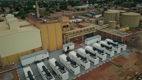 Cinematic-Drone-Shot-of-Container-Power-Plant-in-Niger,-Africa