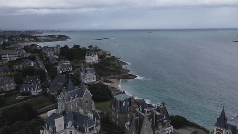 Drone-flying-over-luxurious-villas-on-Dinard-cliffs,-Brittany-in-France