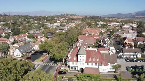 Aerial-low-panning-shot-of-the-quaint-Danish-town-of-Solvang-in-Central-California