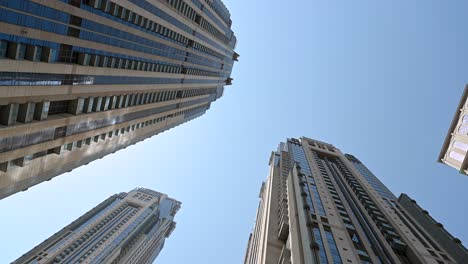 4K:-Modern-highrise-tower-at-Dubai's-Business-Bay,-United-Arab-Emirates