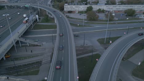 Aerial-view-of-the-structure-of-freeway-interchanges-and-underpasses-with-morning-traffic