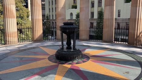 Static-shot-of-spectacular-shrine-of-remembrance-and-eternal-flame-burning-at-its-heart,-Anzac-Square-war-memorial-parklands-at-Brisbane-city,-central-business-district,-Queensland,-Australia