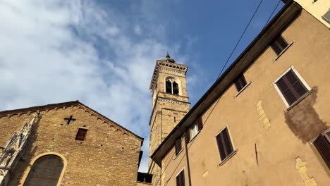 Church-spire-and-bell-tower-in-historic-cultural-city-Bergamo-in-Italy