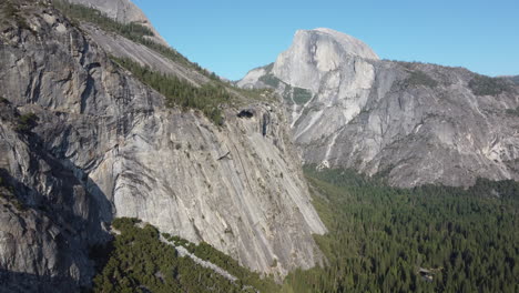 Yosemite-National-Park,-shot-towards-the-mountain-cliff-with-a-cave