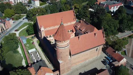 Aerial-View-Of-Medieval-Castle-Kapituly-Warminskiej-in-Olsztyn-City-Poland