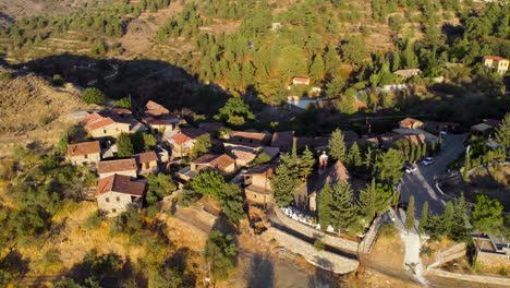 Aerial-sunset-drone-footage-of-traditional-deserted-medieval-countryside-village-Phicardou-,-Nicosia,-Cyprus
