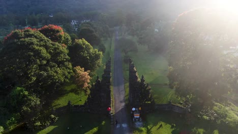 Iconic-Handara-Golf-Gate-during-bright-sunshine,-aerial-drone-view