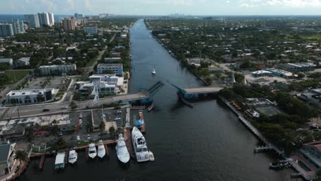 Aerial-View-of-Pompano-Beach,-Florida-USA,-Atlantic-Boulevard-Drawbridge,-Boats-and-Marina,-Drone-Shot