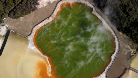 Aerial-of-Champagne-Pool-in-Waiotapu-Geothermal-reserve,-popular-tourist-attraction-in-New-Zealand