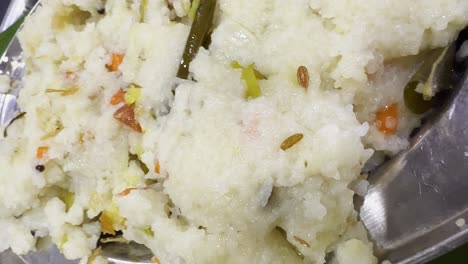 Close-up-shot-of-delicious-rice-pudding-served-been-on-a-plate-in-a-restaurant