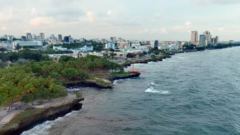 Malecon-promenade-and-the-George-Washington-avenue,-sunny-in-Santo-Domingo---aerial-view