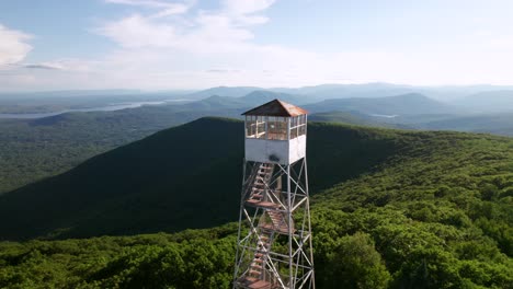 360-aerial-of-a-Fire-Tower-in-beautiful-late-summer-mountains