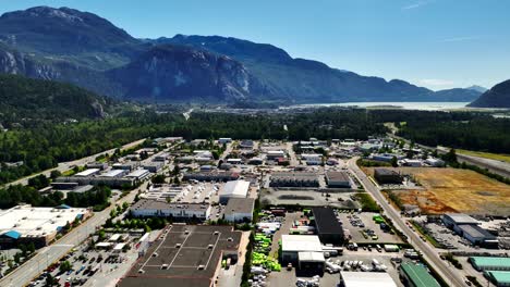 Aerial-View-Over-Commercial-Area-In-Squamish,-Northern-Vancouver,-British-Columbia,-Canada---drone-shot