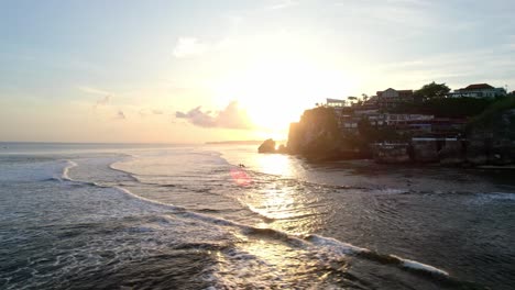 Aerial-sunset-view-of-Uluwatu-bali-island-surfer-spot-travel-indonesia-holiday-destination-in-Asia