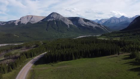 Revealing-highway-in-mountain-area-covered-with-trees