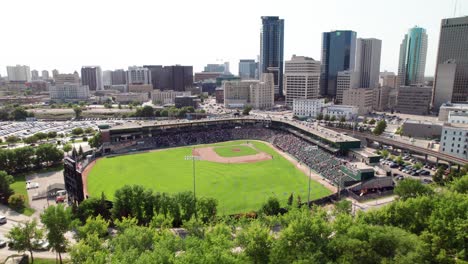 Minor-league-baseball-game.-Ballpark-and-city-skyline