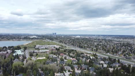 City-downtown-covered-in-clouds-and-surrounded-by-communities