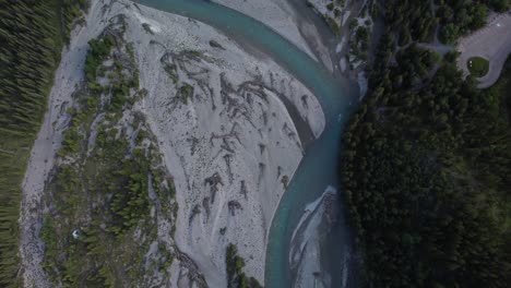 Straight-down-shot-of-the-mountain-river-in-a-summer-time