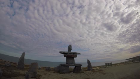 Time-lapse-of-the-Inuksuk-on-the-shores-of-the-Hudson-Bay-Churchill-Beach-Manitoba-Northern-Canada-in-summer