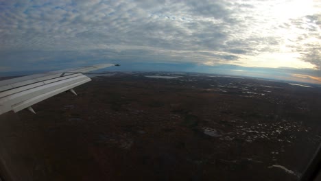 Landing-at-Churchill-Airport-Manitoba-Northern-Canada-view-from-plane-window-time-lapse