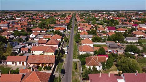 Drone-flying-over-a-street-in-a-small-hungarian-town-1