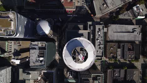 Aerial-view-over-the-Vancouver-Lookout,-in-sunny-Canada---top-down,-drone-shot