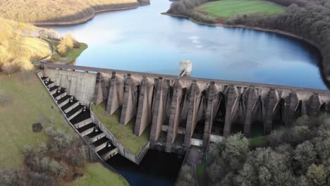 Aerial-Of-High-Walled-Concrete-Dam-At-Wimbleball-Lake